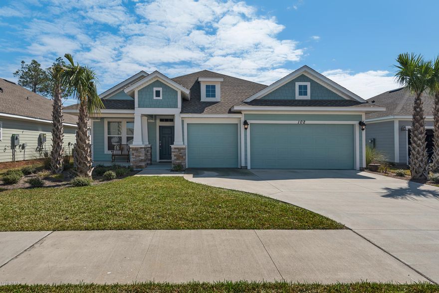 **THREE CAR GARAGE** This David Weekley Homes built Clarabelle floor plan is just over one year old, in fantastic condition and loaded with upgrades. The owners added a TV hookup outside on the lanai, prewired the living for 7.1 surround sound, insulated key interior walls to reduce noise, added storage space in the attic above the garage and even installed a Nest Thermostat. There is even room for a pool! Everyone loves the extra parking in the oversized driveway and the extra space in the garage for storage and that golf cart you will need to roam the neighborhood. The master bathroom is spacious and features a massive ''super shower'' and walk-in closet. Enjoy the open main area, upgraded kitchen and split floor-plan. No need to wait to build. This home is available now.