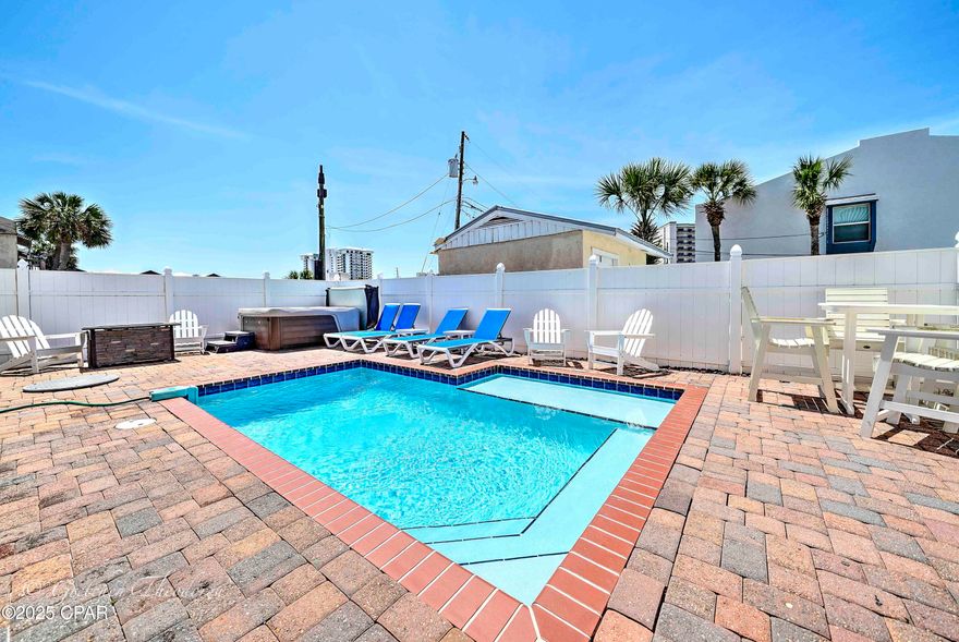 BACK ON MARKET!! HOUSE IS PERFECT! Financing 
issue for buyer.  Exceptional GULF views - Turnkey & Income-Generating.

This impeccably maintained home is the epitome of coastal luxury—complete with a private heated pool, relaxing hot tub, cozy fire pit and a move-in ready interior. Featuring two living rooms, three spacious king en suite bedrooms plus additional bunk accommodations, there's ample room to comfortably host three families......sleeps 14!!

Located just steps from the beach, this home includes a golf cart, allowing you to effortlessly cruise to the shoreline or enjoy a scenic stroll—that's how close you are. With a solid rental history generating approximately $126K in gross income for 2024, a 9.8 rating on VRBO and a 4.8-star rating on Airbnb (which transfers to the new owner), it offers an excellent investment opportunity.

Recent upgrades include fresh interior and exterior paint, a new water heater, updated window blinds, sand filter for pool (Dec. 2024), composite decks on the second and third-story balcony—providing low-maintenance comfort and style.

Don't miss the chance to own this extraordinary beachside gem. Contact your favorite Realtor today to schedule a private tour—you're going to fall in love!
Buyer to verify all measurements.