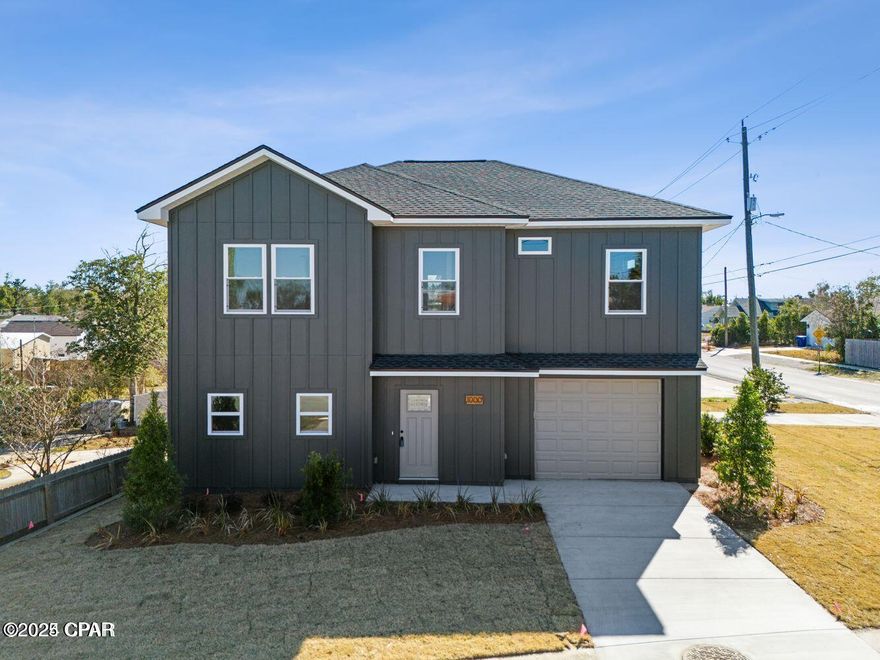 Enjoy the best of both worlds in this 2023 ''almost new'' COVE HOME. You'll love this downtown location AND all the benefits of new construction!  If you've  been looking for a downtown property with quick access to the Hospital, Marina, Art Galleries, Shops and Restaurants, this is it!  
The interior boasts a spacious and open floor plan with loads of natural light. An upgraded kitchen has upscale stainless appliances, bright white QUARTZ COUNTER TOPS,SLEEK RANGE HOOD and a HUGE ISLAND, Upstairs includes 3 large bedrooms and access to a FABULOUS COVERED DECK with a charming WATER VIEW. It's the perfect entertaining spot, made even better by a BEAUTIFUL WET BAR including a wine fridge, sink and QUARTZ COUNTERS. All located close to the deck access. The stylish master suite also has a private door to the deck and enjoys a view of the Bayou. The MASTER BATH is a show stopper with upscale Black Tile in an over sized glass shower. It's like your own private spa! The exterior has HARDIE BOARD SIDING, a sprinkler system and nice landscaping. It also features a front garage (EV Charger),  convenient side access with a 2nd driveway and NEW STORAGE BUILDING for all your extra stuff! Don't miss this opportunity for a Cove Home with NO HOA 's, NO Flood Insurance Required and low homeowners insurance premiums!