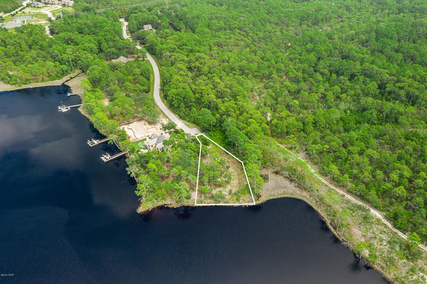 This is a RARE OPPORTUNITY to own in the 734-acre gated community of Wild Heron that eventually will have less than 600 residences!! This private .59 acre, estate-sized homesite features 89 ft. of Waterfront footage on Lake Powell! Build your dream home on this one-of-a-kind lot with natural elevation and multiple building options and enjoy a plethora of amenities within the community and the local area. Perfectly positioned for views of the Gulf of Mexico and gorgeous sunsets on Lake Powell. Centrally located within easy driving distance to Rosemary Beach, 30A and Beaches of South Walton to the west and Panama City Beach and Pier Park to the East. Wild Heron offers the coveted Greg Norman designed Sharks Tooth Golf Course and Hydrocourt Tennis Courts. The community also features a... swimming pool with lake views, fitness center, nature walking trails, boardwalks and more. The Boathouse offers easy access
to kayaks and canoes to paddle on the lake or across the lake to the Inlet and the Beach.
Owners in Wild Heron may also have the opportunity to join the St. Joe Beach Club featuring private beach access, beach
services, 2 pools, 2 restaurants and a bar with gulf views along with 2 private Golf Courses, Camp Creek Golf Course and
Sharks Tooth Golf Course. Please inquire with membership for more info and the latest offerings.