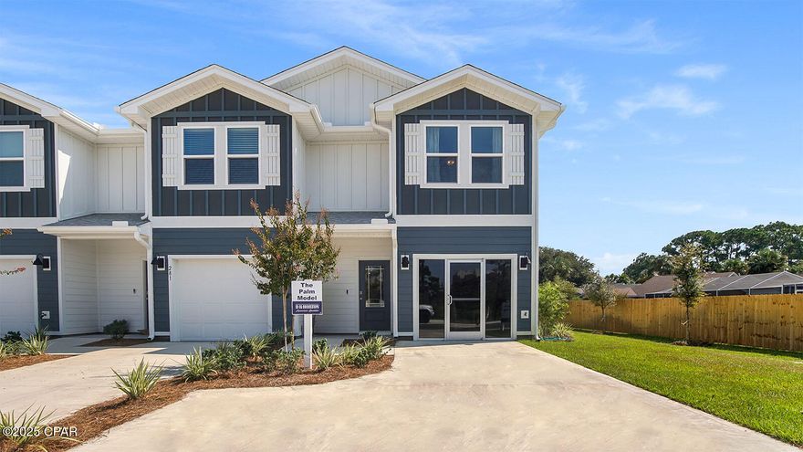 Welcome to 283 Palmeras Marinas Lane, a new townhome at Caballeros Estates Townhomes in Panama City Beach Florida. This townhome is the current model home and sales center, and it has been released for sale. It is being sold as/is however the furniture and window treatments will not convey with the sale. Window hardware and all appliances currently in the townhome will remain. the appliance warranty will be for the time remaining on the item.  This townhome is an end unit townhome; the sales center will be converted back to the single car garage as shown on the floor plan.

As you enter this home you will find a bright hallway leading to an open-concept kitchen, living, and dining area, designed comfort and functionality. Windows illuminate the living area providing for plenty of natural light. The kitchen serves as the culinary center with its spacious center island allowing for easy meal prep and service.

The first floor is the core of the home, while the privacy of the second level holds all bedrooms, ensuring a quiet retreat. The main suite is a sanctuary, featuring a generous closet, an oversized shower, dual sink vanity, and ample linen storage in the en-suite bath. The additional bedrooms share a hall bath with shower tub combo, creating a comfortable space for family or guests.

The interior of this floor plan has been elegantly appointed with EVP flooring throughout the main level and carpeted stairs, upstairs hallway and bedrooms. The kitchen and bathrooms feature granite countertops, beautiful white cabinetry and a brand name stainless steel appliance package with a smooth top stove, microwave and dishwasher. A Smart Home Technology Package comes standard, featuring a Qolsys IQ touch panel, a Honeywell Z Wave thermostat and DEAKO smart switches which can be integrated to control your lighting, thermostat and even secure your home with a single touch