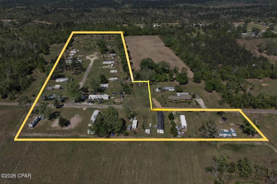 Income producing mobile home park offering 27 lots, 25 that are currently occupied on 10 acres. This established property provides consistent cash flow with significant upside potential through expansion or rent optimization. Ideal for investors seeking stable asset with value-add opportunities. Located in Marianna, FL with convenient access to major roadways, shopping, and local amenities. Opportunities like this don't last!