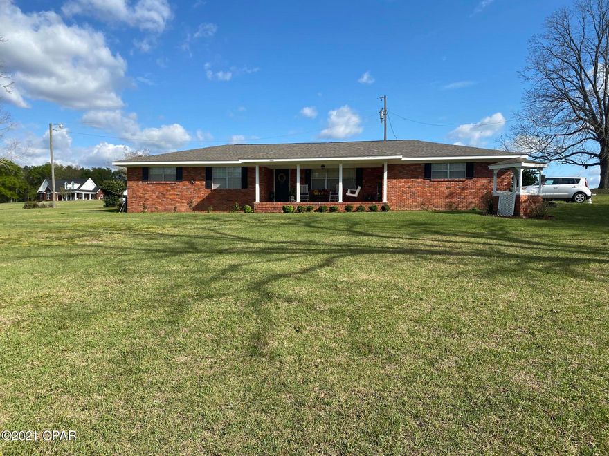 Well-maintained ranch style brick home with brand new roof just installed in March 2021. Other updates include a  new well pump, new stove, new vinyl floor covering in the kitchen and utility room and a newer HVAC system installed in 2018. It has a gas fireplace and features two separate living areas with four bedrooms for a growing family. The yard and the exterior of this home have been well-maintained and there is a covered porch on the front and back of home. It's just waiting for a few custom interior updates to match your very own style.