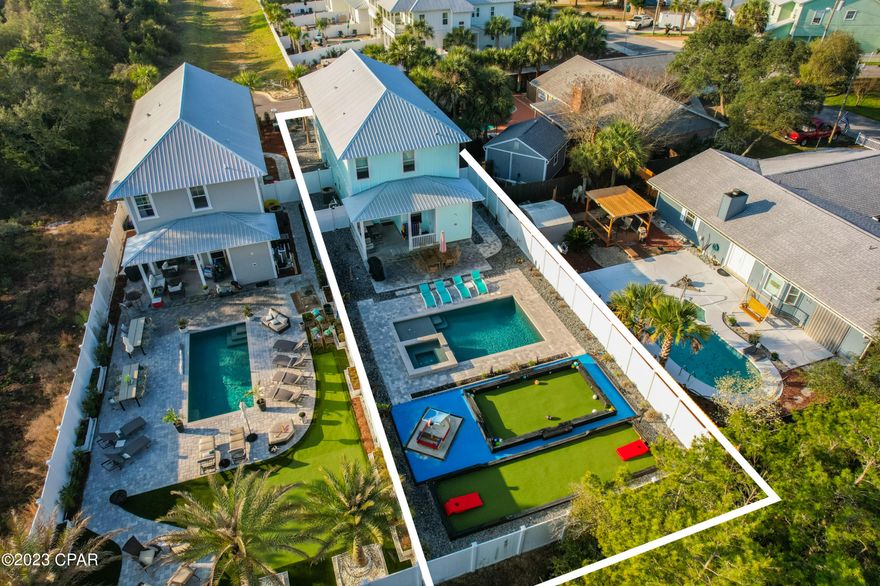 This fabulous custom beach home is all about having fun in the sun. This extravagant home has masses of private space, plenty of parking on the paved driveway and a backyard that boasts a private bocce ball court, Fun Kick pool table, outdoor shower and a pool with spillover spa. When you're tired of all that, access to desirable Laguna Beach is just a stone's throw away. You won't even need a golf cart. This beautiful beach home is ideal for investment or as a fun-filled vacation home. Built to the highest standards, it has a metal roof, high-impact windows and two sets of eight-foot French doors providing a seamless indoor-outdoor lifestyle. Four bedrooms include a sumptuous master suite on each floor, all served by 3.5 baths. Shady porches on both levels provide a private space to escape to with a best-selling novel. The large kitchen is all-important at mealtimes. It has tall 42'' cabinets, a gas slide-in oven and cooktop, an island with breakfast bar and a walk-in pantry. Quartz countertops and a tankless hot water system round off the extra features along with a laundry. Entertaining and family mealtimes are super easy with an outdoor gas grill in the updated backyard space. With so many amenities and entertainment on hand, this fun retreat delivers the perfect family-friendly stay close to Pier Park shopping and dining. Property exceeded $101,000 in base rent for 2022 and a gross of over $132,000 and is on track to do it again in 2023.