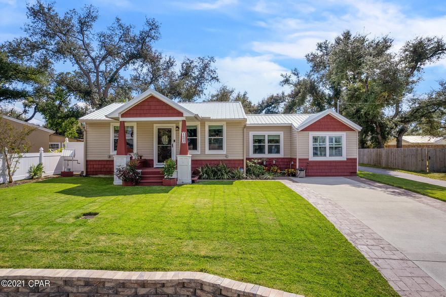 This charming 3 bedroom 2.5 bathroom Florida cottage is located in the Cove with views of Watson Bayou. The main living area features coffered ceiling and 3 large windows letting in loads of sunlight and is open to the updated kitchen/dining area with lots of cabinets, granite counters, and newer stainless appliances. The owners retreat includes a spacious master bedroom with cathedral ceilings and lots of natural lighting. The adjoining master bath features double sink vanity, huge walk-in shower with double heads, and water closet. The second bedroom includes a private ensuite bathroom. Additional features include- new vinyl windows, new metal roof, whole house surge protector, water filtration system, and tankless water heater. The dining area overlooks the massive deck and sizeable backyard with storage building. An alley runs along the side of the house giving easy access for vehicles to enter the back yard area-great for boat storage. 

 The Cove is a sought-after historical area close to the fast-growing downtown Panama City with restaurants, shopping, farmers market, events and more. For the boaters and fisherman, the St. Andrews Bay Yacht Club is an excellent amenity in the neighborhood, just minutes away. As a member, you can enjoy a private boat launch, dining and activities. All measurements are approximate and should be verified by buyer if important. 

Home was renovated in 2010 to add master bedroom, bathroom, and half bath.  Kitchen was remodeled in 2007. 

HVAC system replaced 2020
Roof 2020
New windows 2019