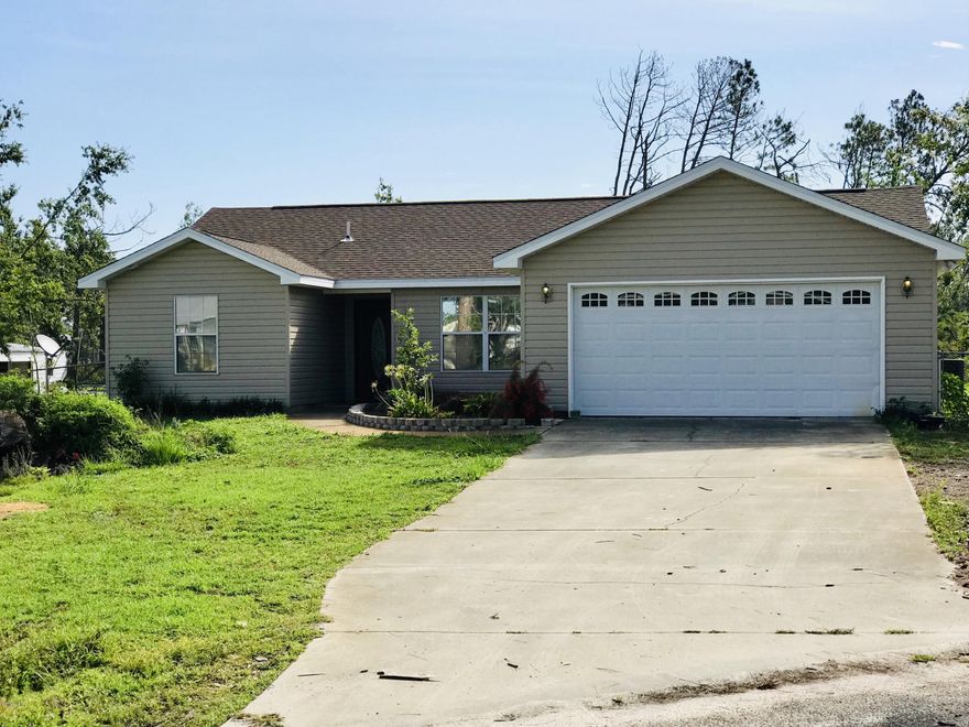 CURRENTLY UNDER CONTRACT, SELLER ACCEPTING BACKUP OFFERS'

Here it is! A move in ready home 3 bedroom 2 bath home on 1/2 acre in a quiet area. This home has a new roof, new siding, and the entire interior has been repainted. With a fantastic open floor plan to the living, dining and kitchen, this would be a great home for folks that like to hang out together! There is even a breakfast nook off of the kitchen that could also be an office space. The laminate wood flooring through out is beautiful and a split floor plan gives wanted privacy. With a two car garage and plenty of driveway space, you have more than enough room for parking! With a half of an acre you have plenty of room to enjoy the outdoors!