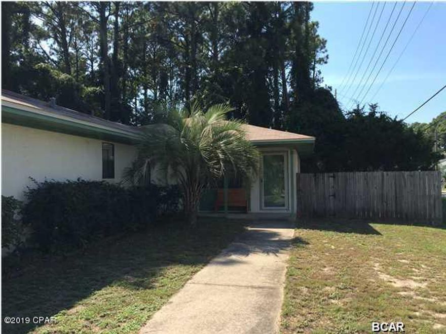 Duplex unit located in the Thomas Drive area. This is a two bedroom one bath unit with all tile floors, kitchen/dining/living room combo with open deck and small fenced yard.