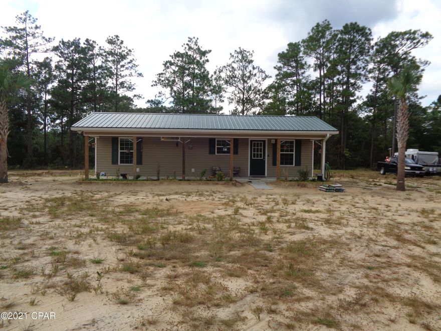 Great home in the country. Sits on over 2 acres. Well built small home good for couple or single person. Home has some furnishings. Stack washer and dryer. Sofa, large screen TV and bed. Move in ready. Owner has internet on at property. Application fee is $50.00  and requires 1 year lease.