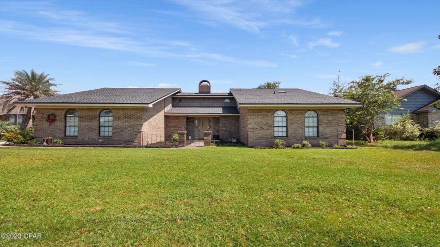 All brick, executive home is a must see! This lovely 3 bedroom, 2 bath home is almost 3000 sq ft! Entry into this grand hope is through a private wrought iron surrounded courtyard and then you step into a formal foyer.  Super nice for those who take advantage of ''delivery'' and provides a nice privacy barrier for the residents! 
This home is high on upgrades and includes a custom kitchen that features all wood oak cabinets, gas 5 burner cooktop, huge walk-in pantry, custom lighting fixture, full double oven, island graphite sink, breakfast bar, granite countertops, tile floors and backsplash - it even has a trash compactor. The kitchen has a spacious breakfast area and had an exterior patio door - perfect location for the grill! The kitchen opens into a huge formal dining room! Plenty of room for everyone here! If you have a showpiece dining table, we've got the room for you!
The living room has 3/4'' hand scraped oak floors with tile inlay, solid oak built in bookcases and matching oak mantle on the brick woodburning fireplace, crown molding is featured in all the living spaces. 
All of the bedrooms are large, but wait until you see the primary suite! From the brick accent wall to the 3/4'' solid tigerwood flooring to the entire wall of closets - this suite should not disappoint!  The primary bathroom is spacious, features a jetted tub and a large walk-in shower, double vanity.  linen storage in the bathroom and in the bedroom! 
This home offers storage throughout! 2 foyer closets! And, it has so many upgrades! 2x6 exterior wall construction, brick exterior, exterior flood lights front and rear, 12x16' storage shed in the rear yard. Septic is set way back from the house so there's room to add a pool! 
This home is in a perfect location - close to the both the Highpoint boat ramp and the boat ramps at the Dam! This location is also super close to town - just minutes from the new Hwy 231 Publix (opening soon). 
Make your appointment to view this lovely home today!