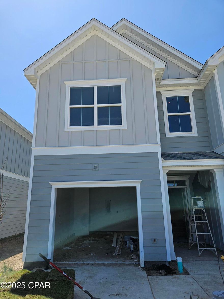 Seagate at Clara is a new townhome community nestled in the vibrant city of Panama City Beach, FL. This two story features board and batten exterior and covered entries. One car garage provide a great space for storing beach essentials. These open concept townhomes boast stylish kitchens with large islands perfect for gatherings. The elegant Owners Suite is designed with comfort in mind showcasing a large walk in closet and double- bowl vanities. The community pool is opening in May with cabanas, lounging, seating and grilling stations. The dedicated dog park with be compete in April. This community is in a prime location with a nice walk to local shopping and the beach. You'll enjoy the white sands of the Gulf of Mexico and be just minutes from Pier Park.