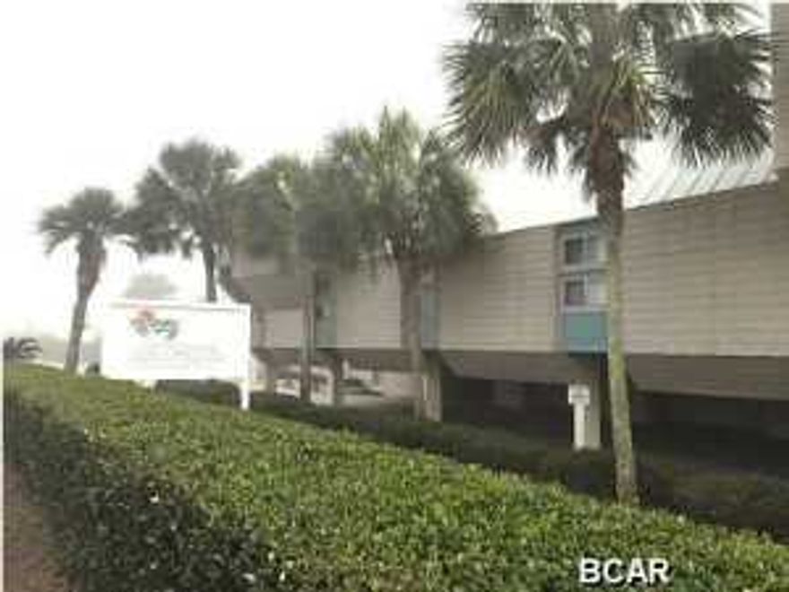 Enjoy those beautiful sunset from your own balcony! Great opportunity to own a gulf front Townhome located on the quiet west end of PCB. This three story townhouse features 3 Bedrooms, 3 Baths and a Garage with an additional storage room to store all your beach gear. It has a beach door that leads directly to the beach boardwalk along the water's edge. Gulf views from the ample porch off the living room and master bedroom balcony. The kitchen, living/dining room, bedroom and bath are on main level. Top floor contains spacious Master bedroom with a walk in closet and a bedroom with private bath. Two hall closets give you lots of storage and can be locked. Only 52 units share 1000 feet of beach front and a large beach front pool. Great property for investment and personal use.