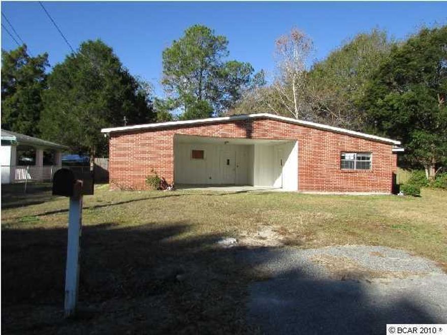 *EQUAL HOUSING OPPORTUNITY* Unique brick home located in Lynn Haven community offers charm inside and outside. Incredibly large backyard is fenced and is pefect for expanding the home, adding a pool, garden or workshop! Floor plan includes a formal living room and dining room excellent for guests, a family room for added space and a kitchen that is light & bright. Country cabinets, tile flooring, crown molding and a breakfast area. Master bedroom contains large closet space and storage. Additional bedrooms are also generously sized. Ceiling fans are found throughout home! So much potential to create the home of your desire. Easy access to downtown Lynn Haven, Deer Point Lake and Lynn Haven Golf Course. This location has it all.