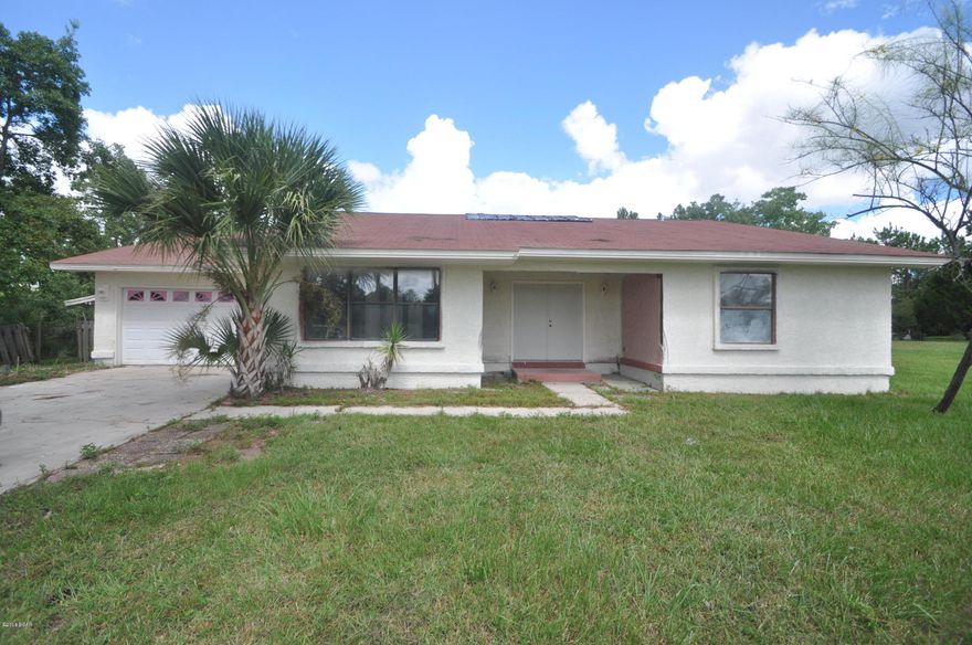 Huge 4 bedroom home. Has an solarium in the middle of the house.. Huge Kitchen This comnes with 2 lots that total almost an acre of land. Back up to a pond. This is a fixure upper.. Owner has spent $30,000 on materials to remodel. New Vanities Toilets exctra....New AC unit Nice fireplace...Call your agent to see... Priced to sell....Will need to be Cash sale or FHA 203K loan