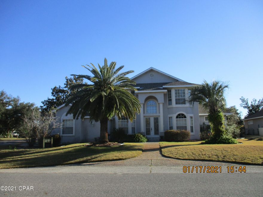 Currently under contract seller accepting backup offers. The Preserve on the Bay! Guard gated community. LOCATION LOCATION! The perfect combination Community, location, value and a flair of serenity.  This two story home with plenty of natural lighting has a great flowing floor plan.  Tile and vinyl flooring  throughout. Enter through the beautiful leaded glass doors into the foyer leads you to the living room, family room with a fireplace,  breakfast room, fully equipped kitchen with stainless appliances, laundry room off the kitchen, entry from the 3 car garage  into the laundry room,  formal dining  room  off the foyer.  First floor master bedroom with a spacious master bath features 2 walk in closets, double vanity, whirlpool tub, separate shower and  computerized toilet. balcony hallway leads to the 3 additional bedrooms  with 2 full baths.  The living room and dining room leads to a lanai with a half bath and plumbed for an outside shower. Gunite inground pool and natural landscaping.