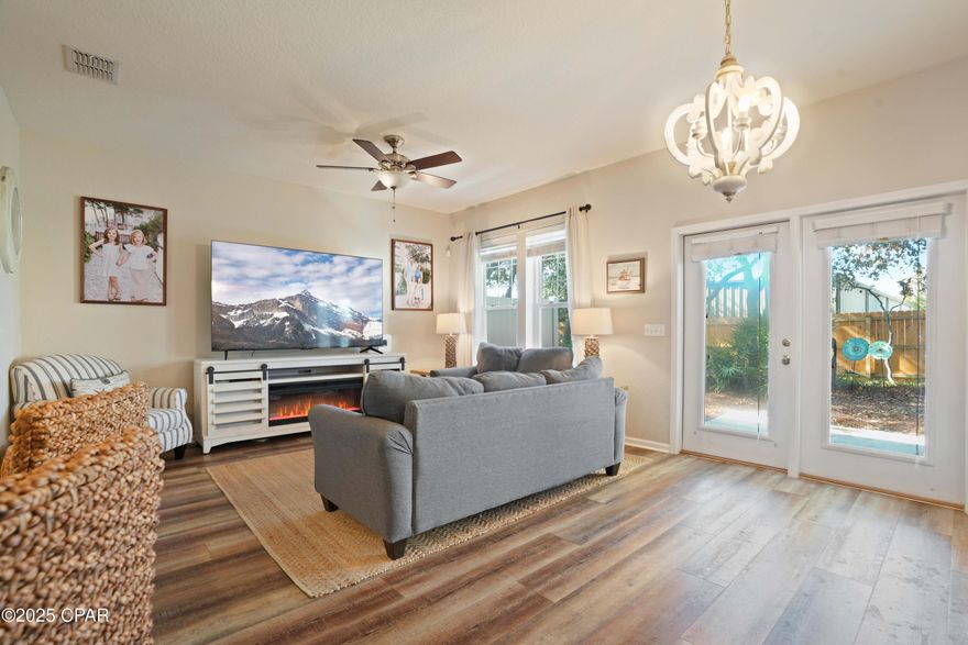 Discover coastal living at its finest on the highly sought-after west end of Panama City Beach--a true hidden gem known for its quiet, peaceful vibe, away from the hustle and bustle of the busier parts of PCB, just ¼ mile from Beach Access 84, and only about 6 miles from 30A and its charming beach communities.

This beautifully maintained 3-bedroom, 2.5-bath townhome, built by Beazer Homes--renowned for quality construction and thoughtful design--is located in the desirable Whisper Dunes community, placing you moments from the stunning white-sand beaches of the Gulf.

Inside, you'll find luxury vinyl plank flooring throughout the main level and new carpet upstairs (2023). The kitchen features stainless steel appliances, including a new dishwasher (2025), along with a convenient breakfast bar--perfect for everyday living or entertaining. A half bath and 1-car garage complete the first floor.

Upstairs offers three spacious bedrooms, two full baths, and a dedicated laundry room, providing comfort and functionality for full-time living or a beach retreat.

Major Updates = Peace of Mind 
This home is truly LOW MAINTENANCE, with all major systems already taken care of:

New Roof (2023)

New Carpet Upstairs (2023)

New Water Heater (2025)

New Dishwasher (2025)

New HVAC System (2026)

Whisper Dunes offers resort-style amenities, including a community pool, relaxing cabana, walking trails, and pet stations. The neighborhood is also golf cart-friendly, making it easy to enjoy the laid-back coastal lifestyle.

Even better, the HOA covers lawn maintenance, pool access, exterior paint/power washing, and the roof, allowing you to enjoy worry-free living in a beautifully maintained community.