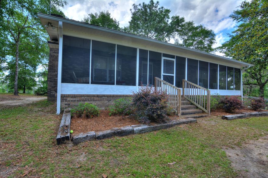 HUNTING AND FISHING PARADISE LESS THAT IS LESS THAN AN HOUR FROM PANAMA CITY BEACH! THIS BEAUTIFUL HOME SITS ON 320+/- ACRES. THE HOME IS 2 STORIES, EACH WITH ITS OWN KITCHEN, DINING, AND LIVING ROOMS, AS WELL AS BEDROOMS AND BATHROOMS. THE PROPERTY FEATURES MULTIPLE BUILDINGS, AS WELL AS A LARGE EQUIPMENT BARN. THE ACREAGE FEATURES A PRIVATE LAKE, AND A BONNET POND, AS WELL AS A WET WEATHER POND. ONCE YOU GET DOWN TO THE LAKE, RELAX IN THE LARGE CAMP HOUSE, FEATURING A FULL KITCHEN, OR SIT OUT ON THE DOCK AND THROW A LINE IN THE WATER. IF HUNTING IS YOUR THING, THEN THIS IS YOUR PLACE! THERE ARE MULTIPLE CONDO STANDS ON THE PROPERTY, AND SETUP OVER POTENTIAL PLOTS. THE ACREAGE IS LITTERED WITH DEER, TURKEY, AND HOG. DON'T MISS YOUR OPPORTUNITY TO OWN THIS ONCE IN A LIFETIME PROPERTY! THERE IS ABSOLUTELY TOO MUCH TO LIST WHEN IT COMES TO THIS PROPERTY. SCHEDULE YOUR VIEWING APPOINTMENT NOW! SECOND PID# 00000000-00-5518-0000 4 3 16 140 ORB 281 P 376 N1/2 OF SW1/4, E1/2 OF SW1/4 OF SW1/4, SE1/4 OF SW1/4, ORB 883P 295