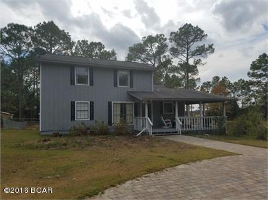 Beautiful Country Home on 2 acres with 2 ponds full of fish!  There is a large front porch to enjoy the quiet, peaceful neighborhood.  The living area is open and spacious with plenty of room for all of your needs!  The home features vaulted ceilings, GE profile stainless steel appliances, granite counter tops, solid wood cabinets & travertine floors!!  The master suite has his and her closets, marble top vanities, whirlpool tub & separate tile shower.  There is also a large carport, workshop area & Basketball goal & court. Call today for more information on this beautiful home!