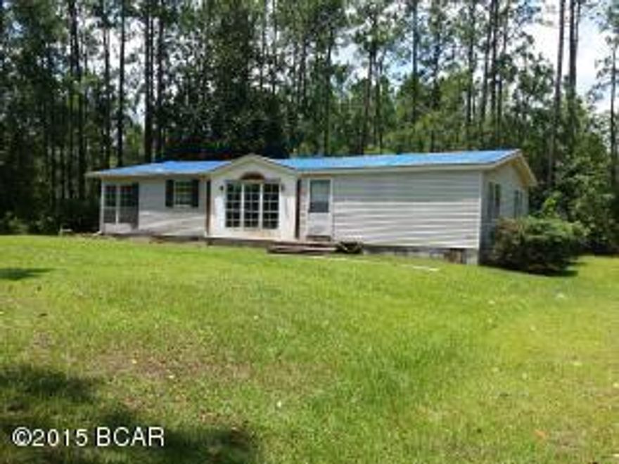 You will have all the space you need on this 1.01 acre parcel with a double wide mobile home and detached garage. The home is 3 bedroom 2 bath home with fireplace, breakfast nook and large master. The detached two story garage measures 24x25 on the first floor and 25x18 on the top floor and would make a great workshop or the upstairs could be converted into a separate living space. Close to town, but far enough away to escape the hectic pace. You will want t to schedule a showing with your agent today to see this Fannie Mae Homepath property. All measurement, room sizes and ages are approximate. Please verify if important.