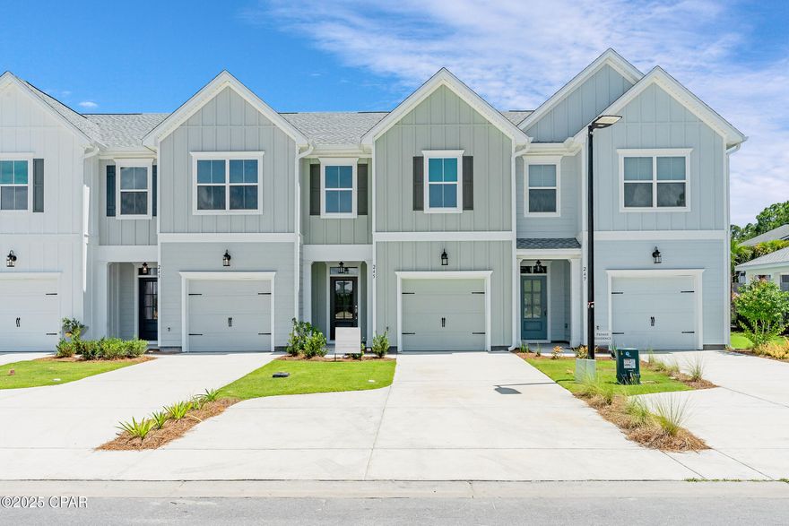 Our stunning pool is NOW OPEN! The prefect place to SOAK UP THAT Florida SUN! Seagate at Clara is a new townhome community nestled in the vibrant city of Panama City Beach, FL. This two-story features board and batten exterior and covered entries. One car garage provides a great space for storing beach essentials. These open concept townhomes boast stylish kitchens with large islands perfect for gatherings. The elegant Owners Suite is designed with comfort in mind showcasing a large walk in closet and double- bowl vanities. The community pool features a cabana, lounging, seating and grilling stations. This community also includes a dedicated dog park. Seagate at Clara is in a prime location with a nice walk to local shopping and the beach. You'll enjoy the white sands of the Gulf of Mexico and be just minutes from Pier Park.