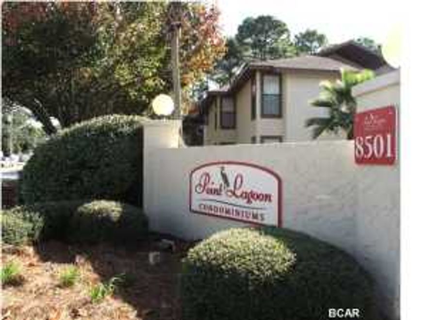 Great investment opportunity centrally located on Panama City Beach! Point Lagoon is a waterfront community located in the heart of Panama City Beach, convenient to shopping, restaurants and beaches. Point Lagoon Condominiums has an in-ground pool, boat storage available, and community dock and pavilion on the lagoon. This one bedroom, one and a half bathroom condo is on the second floor and has relaxing views of the native oaks and magnolias. Featuring newly installed ''16 ceramic tile flooring, enjoy the perks of low maintenance flooring at the beach. The condo is now updated with fresh paint in the kitchen and bathrooms! Perfect for entertaining, the unit has an open floor plan with the kitchen overlooking the dining and living room. All appliances convey including a new