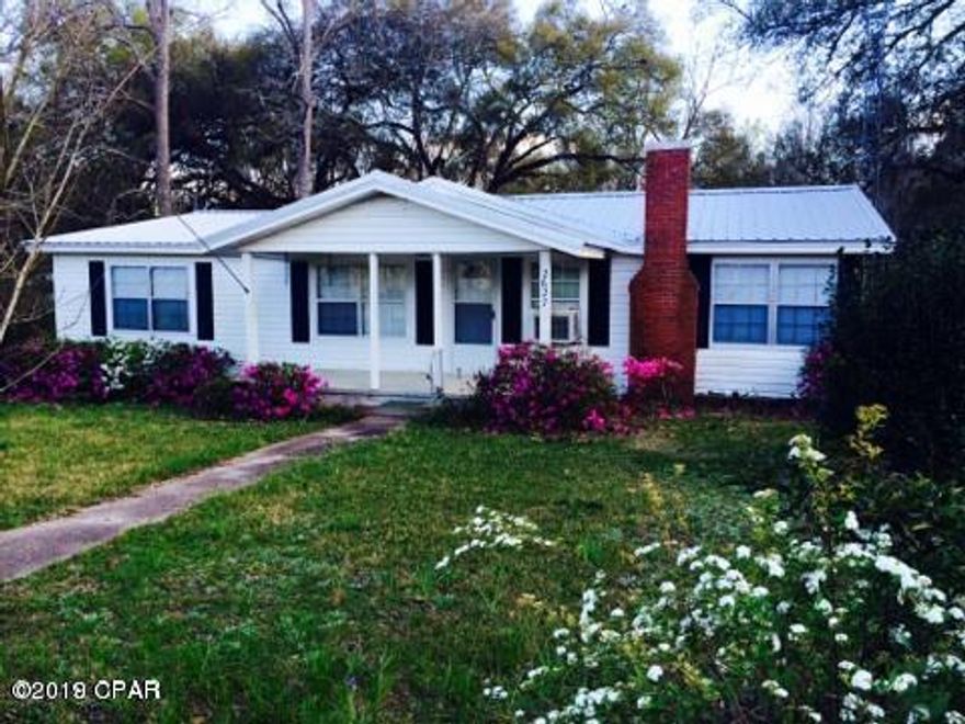 Cute 4/2 home located within the city limits of Cottondale. Home has beautiful tongue and groove walls, wood floors and lots of room. Outside features an attached two car carport along with a separate enclosed area that was formerly a barber shop. All sitting on over an acre of land.
