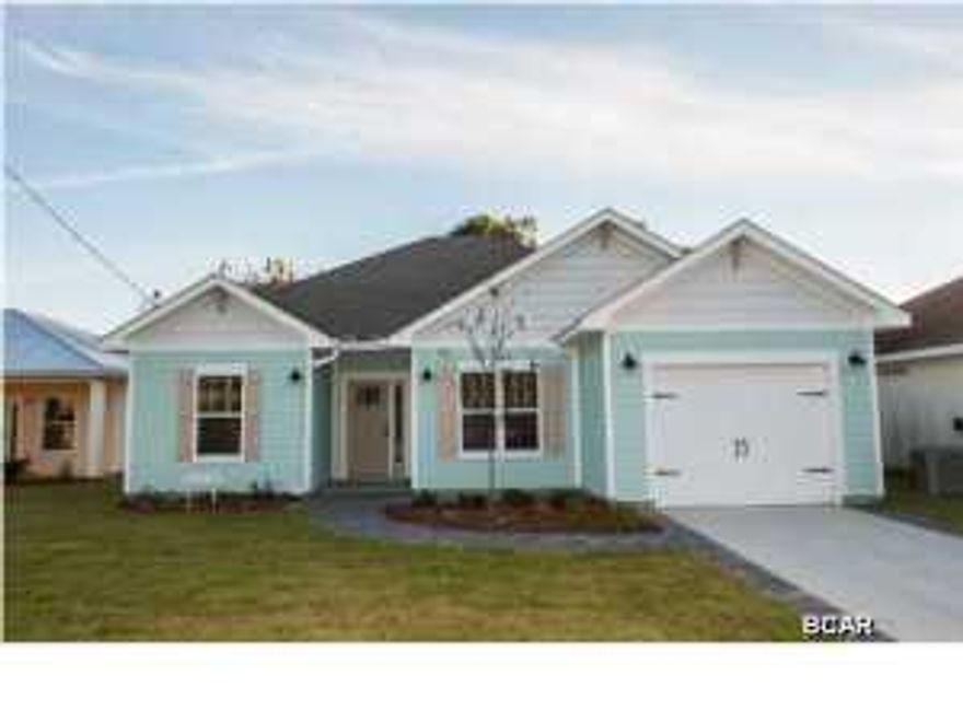 WOW factor Alert! This gorgeous Coastal Craftsman Designed and constructed by the beach's leading custom home builder with upgrades you will typically only see in high end custom homes. Quality and Craftsmanship are demonstrated through out. Every designer touch has been incorporated into this home. From soft and inviting paint colors to upgraded coastal cabinetry, unique and upgraded crown moldings, accent painted interior doors and beautiful fixtures through out. Don't let the Square Footage size deter you from looking at this home. IT FEELS MUCH BIGGER THAN IT IS Because of the thoughtfully designed Open floor plan and high ceilings, soft and light paint colors and lots of natural light. Contemporary wood-look plank style ceramic tile floors throughout. Gorgeous granite