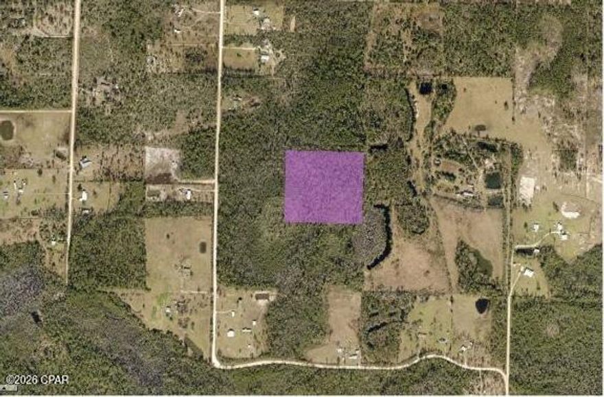 Secluded 10 acre vacant land offering a mix of buildable area and natural woodlands. Ideal for agricultural use, recreation, or a private homesite.