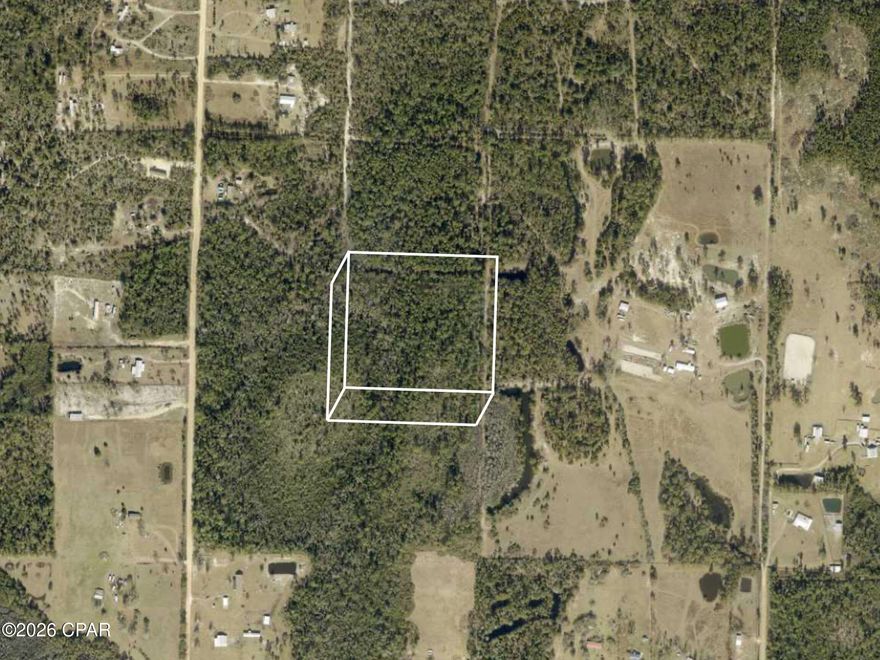 Secluded 10 acre vacant land offering a mix of buildable area and natural woodlands. Ideal for agricultural use, recreation, or a private homesite.