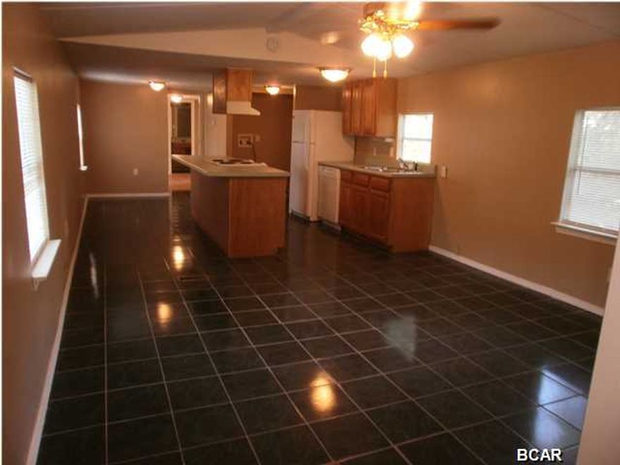 This quiet singlewide mobile home is located in Callaway with new paint and recently finished tile and wood flooring. It has an open cozy living and dining room. A nice laminated kitchen island. Features a washer and dryer hook up, and a brand new fridge and dish washer. Master bedroom has a relaxing tub and shower with a walk in closet.