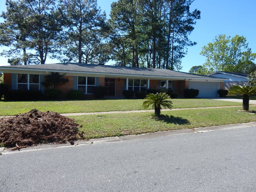 No Damage! New roof being installed by seller. Home has 4 bedrooms and 2 bath. This home has a great open floor plan with kitchen overlooking the family room. The kitchen is brand new with granite counter top, island, stainless steel appliances, back-splash. New flooring throughout the home (no carpet). Formal dinning area and formal living room. The Family room incorporates a Fireplace with French Door views of the pond and back yard. Roof is only 7 years old to include the a.c. unit. Bathrooms have also been remodeled with hallway bathroom having a gorgeous master counter imported from California. The laundry room is 18x15 and can also be used as an office or hobby room. The back yard has a sprinkler system and yard building. Home sits on a large lot at 104 x200 (2 LOTS).