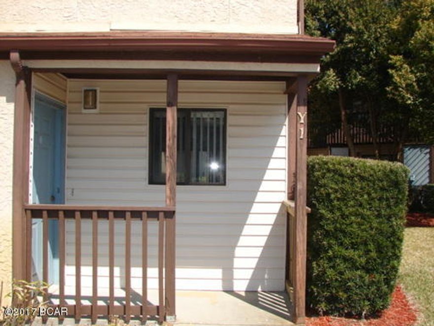 Portside Resort Townhomes located near Pier Park with beach access across the street, pool & tennis court on the grounds, washer & dryer hookups, and balcony off of large master bedroom.