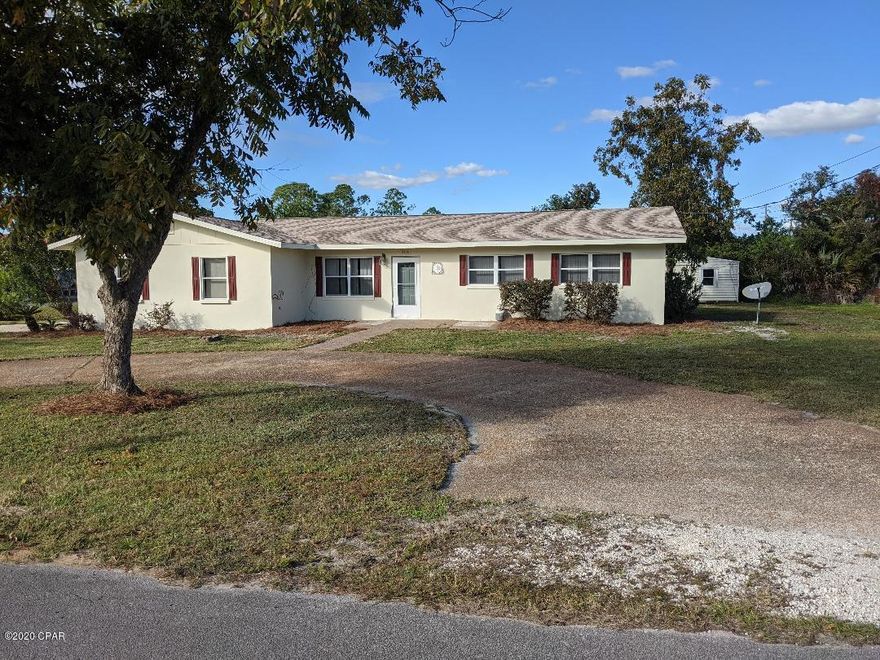 CURRENTLY UNDER CONTRACT SELLER TAKING BACK UP OFFERS////All sizes are approximate/////A wonderful home !!!! 3bed 2bath block home close to the water and around the corner from Shoreline Circle Public Boat Ramp. ////This home  features tile floors in the main living areas, 2 car garage, walk in tile shower in the master bath, formal dining area, and a nice covered porch to relax on for those nice Florida evenings. Home also has a storage shed. NEW ROOF, FRESHLY PAINTED INSIDE AND OUT, NEW LPV FLORRING IN ALL 3 BEDROOMS/////ALL SIZES ARE APPROXIMATE BUYER TO VERIFY////