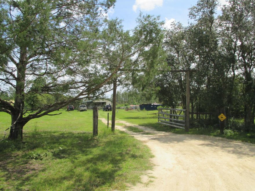 If you are looking for privacy, a place for your horses or simply need room to stretch, this may be it.  This 23 acre parcel is a very attractive combination of pasture, and woodlands.  The 3 bedroom 1 bath house has a new metal roof and a large covered  porch with a hot tub.  The living room has an old fashioned wood burning stove that the seller is leaving for the new owner.  The property includes a yard building for storage and a 24 x 36 barn.  The large area immediately surrounding the house is fenced.  Call anytime to schedule your showing.   Measurements are approximate, verify if important.