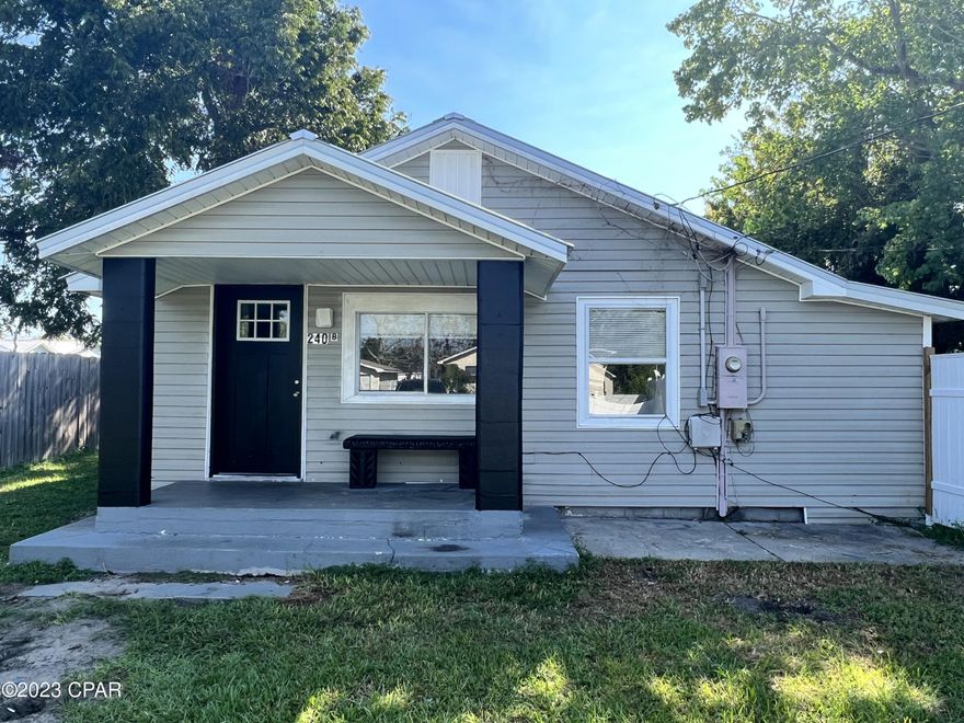 ''CURRENTLY UNDER CONTRACT, SELLER WILLING TO TAKE BACK UPS.'' This is a perfect property for an investor or as a starter home PLUS there's monthly income potential with the rear apartment. The main home is a 2BR/ 1BA with 888 sq ft. The 1BR/ 1BA unit is 400 sq ft with a private driveway and a nice vinyl privacy fence in between the two buildings. The primary house features a covered front porch and a rear deck with composite flooring. Updates include: metal roof 2019, refrigerator new, dishwasher 2022, stove/oven 2020, water heater 2019,  HVAC 2019, all new floor joists, new sub floor and interior floor covering, windows, doors, insulation and more! The main home has a spacious back yard with rear wooden privacy fence. Located near downtown Panama City. Dimensions approximate, please verify if important.