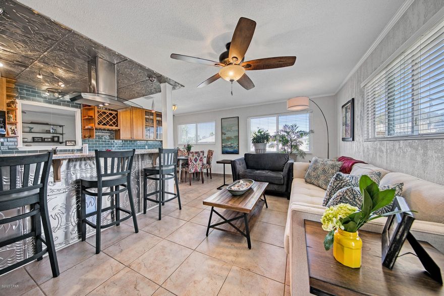 CUTE FLORIDA COTTAGE!!! 3 BEDS, 2 BATHS!!! On the Desirable West End of PCB! Close to the Beach. In a Great Golf Cart Friendly Neighborhood! Beautifully Done!

Entry has Rustic Brick Floors. Tile Floors Are Throughout the Rest of the Home and are Ideal for Beach Living. The Updated Kitchen has Beautiful Granite Countertops, a Breakfast Bar, GE Profile SS Gas Range with Electric Oven, Milano Free Standing Hood, GE Advantium Microwave/Oven and Hickory Cabinets, Some with Glass Fronts. Built For The Beach Life!!

Has A Fantastic Screened Porch, Firepit, a 2nd Patio on East Side and a Covered Golf Cart Spot! Outdoor Shower, Large Shop Building that is Wired. House Roof was Replaced in 2009,  HVAC System August 2014, Gas Water Heater March 2015. If Details/Dimensions are Important, Please Veri