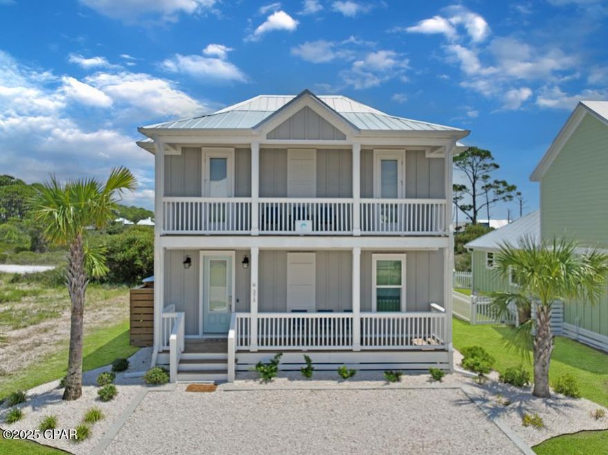 COASTAL LIVING AT ITS FINEST!! Welcome to 373 Rhonda Del Sol Cir--a beautifully designed 3BR/3.5BA  retreat or vacation rental with Gulf Views just steps from pet-friendly beaches & the pristine waters of St. Joseph Bay in the sought-after gated community of Villa Del Sol. Perfectly positioned next to HOA undeveloped land, this home offers a rare sense of openness & privacy while moments from all the best of Cape San Blas living. A fresh seaside color palette paired with durable tile flooring throughout makes for effortless coastal style. Inside, an open-concept floor plan with 9' ceilings creates a light & airy atmosphere, enhanced by Smart Home Technology & upscale finishes. The spacious living & dining areas flow seamlessly into a stunning kitchen featuring stainless steel appliances, quartz countertops, decorative backsplash & a large center island doubling as a breakfast bar--ideal for entertaining. The main level primary suite offers comfort & convenience with a double vanity, his & her closets & a glass door tiled shower. Additional first-floor features include a half bath, generous laundry room, walk-in pantry & mud room. Upstairs, two private guest suites each feature tiled tub/shower combos & access to a covered balcony with peaceful sunset views over the coast. Outdoor living is equally inviting with a covered front porch, open deck for grilling & relaxing, plus storage for all your beach gear. Villa Del Sol's unmatched amenities include deeded beach & bay access, a scenic boardwalk to the beach, community pool, beach volleyball, & pickleball courts--all  right a ross from the home. Steps from the 10-mile bike trail & nearby Salinas Park for walking trails, fishing, kayaking, shelling & horseback riding along the shore. This is the complete coastal lifestyle. Call for your private tour & LIVE THE BEACH LIFE!