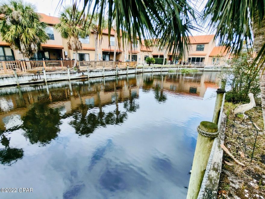 'CURRENTLY UNDER CONTRACT, SELLER ACCEPTING BACKUP OFFERS' ~ ''Glassback'' unit in Gulf Highlands Beach Resort. Looking for a 2 BR unit on the CANAL with an EXTENDED PATIO and an END UNIT too! Come check this unit out, it won't last long. Both BR's have their own PRIVATE BATHROOM. Laundry Area is upstairs. Large open area downstairs is great for Entertaining. Resort has 11 POOLS, 4 Tennis Courts, 18 Hole Mini Golf, GULF FRONT Club House with Pool & Snackbar. Age, SF, and Dimensions are approximate.... please verify if Important.