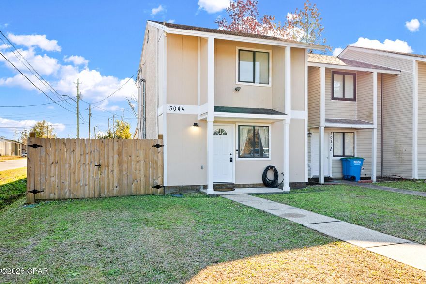 You have to see this nicely remodeled and Move-In-Ready townhome! Having two great-sized bedrooms with a full bath upstairs and a large, open living/dining area with a centrally located and freshly remodeled half bath downstairs, this home offers a BANG for your buck while embracing a naturally comfortable feel all at once!  =>This home sits on a large corner lot with a huge privately fenced backyard and covered patio. This home also includes a Grand Double Gate on one side offering the potential for storing any jet skis, trailers, or even small campers if you choose!
 => The potential for entertaining your guests or having family gatherings couldn't be greater with all of the features included with this home!
  =>Washer and Dryer can be included..
  =>One bedroom also has its own private lock and key..
  =>This is a MUST SEE IN PERSON and will sell fast! 
  =>Call/Text April Hinds now at 850-890-1570 for showing opportunities!