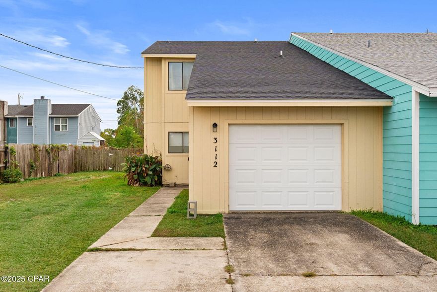 Well-maintained split level, attached single family home featuring a roof and HVAC system both less than 5 years old. This property offers a functional layout with a spacious living area with a wood burning fireplace, a practical kitchen and dining area as well as a half bath on main floor.  The three bedrooms and two full bathrooms are all located upstairs.  Exterior features include a generous yard in a convenient location.  Move-in ready and ideal for a variety of buyers.