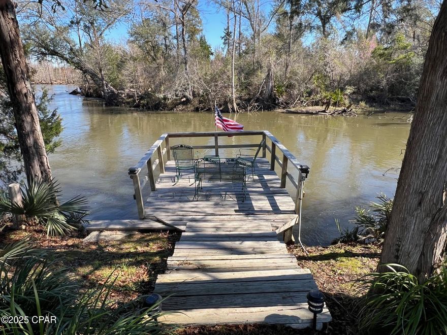 This is a beautiful 90-acre tract with over 500 LF on the Chipola River with a nice well maintained home. Private boat ramp. Nice private fishpond on the property. Deck over river. Paved roads all the way to the property.