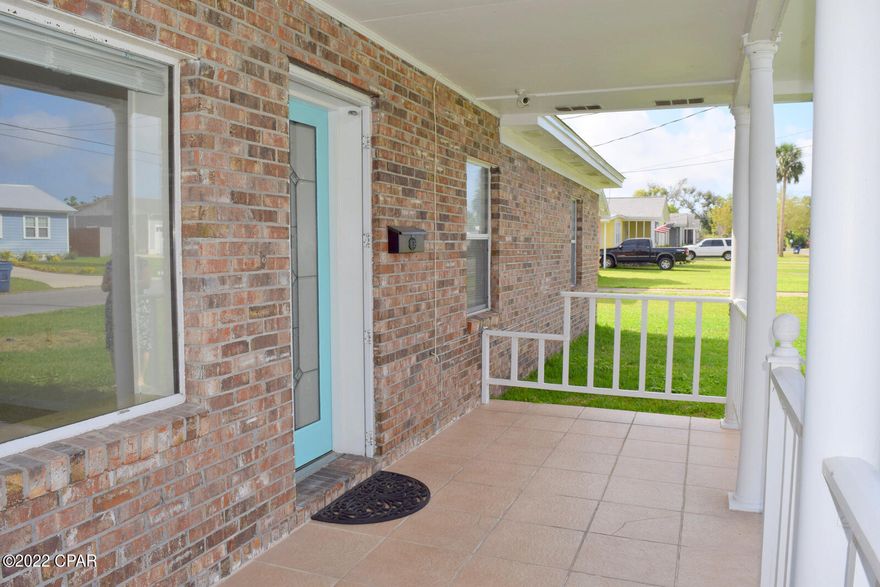 Walk to the Bay....St. Andrews Charmer! Spacious 3Bd / 2Ba  home in quiet neighborhood close to dining and parks recreation. The covered front porch catches beautiful bay breezes and overlooks a grassy corner lot with fruit trees. Move-in ready with w/open living/dining room combination  and a gas fireplace for cozy enjoyment.  Updated lighting and fixtures.  Extra-large Master bedroom features a walk-in closet with built-in shelves. Large fenced yard and side patio for outdoor activity. Storage shed in back. Super Clean!!!