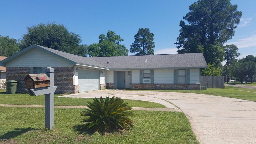 This home is nestled on a large corner lot in the cozy Pine Forest neighborhood.  Home features tile and carpet throughout, vaulted ceilings, security system, oversized two car garage with lots of shelving and cabinetry.  All window treatments stay with the home (blinds).  Come see your new home!