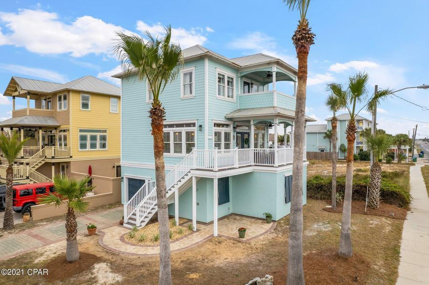 Welcome to ''Sea Salt Bellevue''~ A stunning & well-loved family beach house/non-rental.  Gorgeous gulf views from Living Room, Master Bedroom & Lanais.  A Designer's delight- beautifully decorated as if it came straight from Coastal Living Magazine! This is turn-key! Waiting on your first guest, which could be you! Sea Salt paint throughout interior & exterior, new trex decking on both porch levels & stairs.  New exterior pavers.  Attached garage is a huge bonus to protect your vehicles & ample storage. Unbeatable location - crosswalk is literally at front door & right across street from beach access 7.  Location is the favored ''quite east end'' - and within walking distance to world famous Schooners, St. Andrews state park, marinas & favorite dining spots! Easy to show! 2 newer AC's, Pavers, trex decking, fresh paint throughout, Turn-key with nothing to do! Items that do not convey: Lawn tools, lawn equipment, golf cart, and lemon/fruit cannisters on bar.