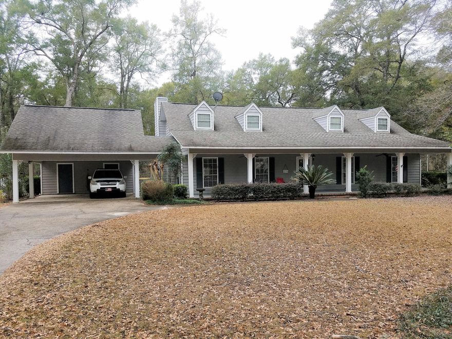 Gorgeous three bed, two bath home in Indian Springs with a beautifully landscaped, fenced yard. Home has been completely updated in the past ten years including new flooring, tile showers, new central a/c unit, hot water heater, new doors, and handicap accessible master bathroom. It features a very nice open floor plan and spacious laundry room with mud sink! On the back side of the home is a 15x19 foot Florida room with lighted tray ceiling. Owners have equipped the house with a generator to run the well so you are never without water! There is also an outbuilding included, already insulated and wired for electric. Make your appointment to see today!