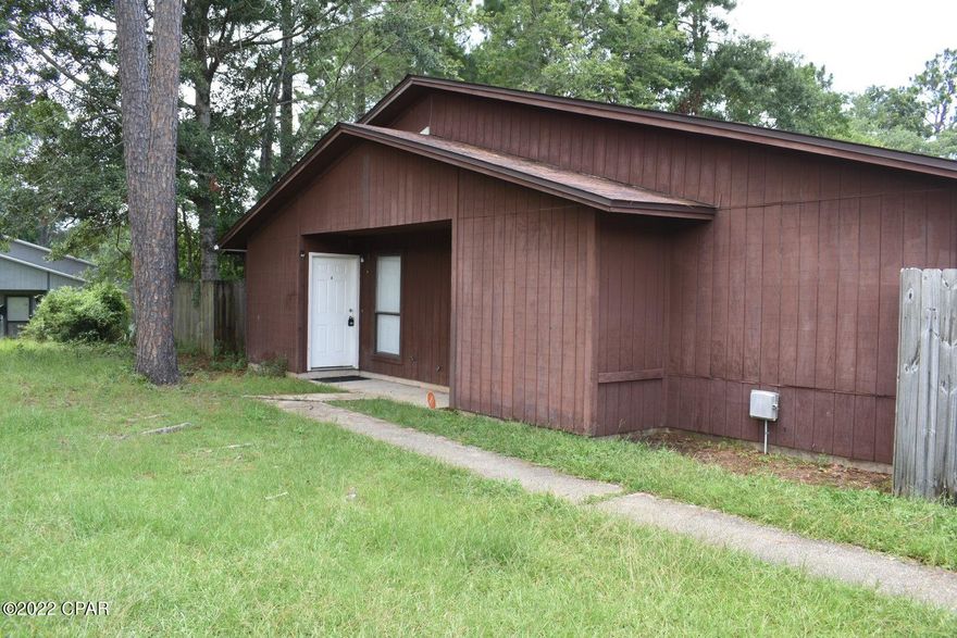 **Sold.**  Cute, affordable, 2 bedroom/2 bath townhouse in a prime location, close to everything in Pensacola. This townhouse has close to 1,000 sf with low maintenance wood look vinyl flooring throughout.  There are 2 nice size bedrooms, nice size kitchen with pantry and open dining/living area with a sliding glass door opening to your private courtyard. Don't wait to take a look. It won't last long.