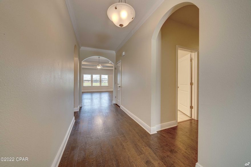 South facing home. Near Tyndall AFB. Very well maintained 4 bedroom 2 1/2 bath home within walking distance to great school, North Bay Haven Academy.Fenced backyard. Large deck , patio with hot-tub. 'Custom ' storage and garden shed. Nature Preserve in front of home and pond in back. 9 ft ceilings thru out treyed up in livingroom and Mbedroom, granite counter-tops. Stainless Steel appliances including Refrigerator, Custom blinds, Nest doorbell, oak swing on porch. Community pool. Custom hurricane shutters. House is so well built the Homeowners Insurance is less than $900 per year! New Publix's coming nearby. Owner agent.  Easy to see. Vacant move in ready.