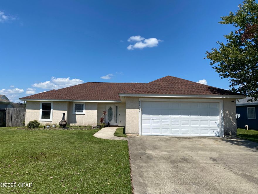Just Reduced!  This 3 bedroom 2 bath home has a great open plan with a split bedroom plan.  There is a great covered porch on the back over looking the large back yard with privacy fence.  The garage is slightly oversized and has a workbench built in as well as some shelving.  The interior painting was just completed, ceilings, walls and trim.  The Roof is newer, (2018) well as the AC and water heater.  The home does need a coat of paint on the exterior.  The kitchen cabinets could use a nice color with some new hardware and that would make a huge difference.  This is now a good deal so call your agent today and get out and take a look!