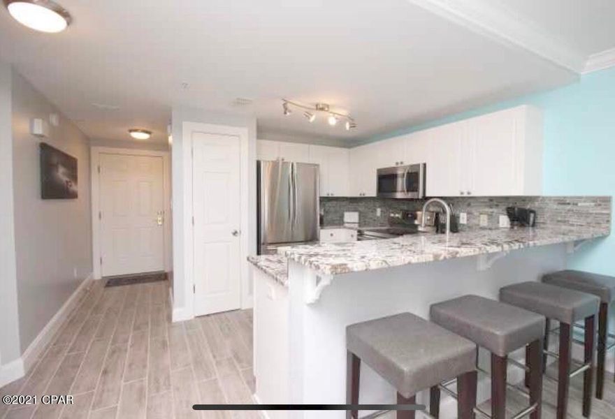 CURRENTLY UNDER CONTRACT, SELLER ACCEPTING BACKUP OFFERS Highly desirable furnished 2 bedroom 2 bathroom condo in Ciboney Condos. Just a short walk to Pompano Joes and Silver Sands Outlet Mall. Ciboney 1002 has updated tile flooring, granite counters, shiplap bathrooms which make for the perfect short term vacation rental or 2nd home. First floor unit walks out to a private patio with gulf views, just steps from the white sandy beaches. Ciboney offers gated beach access, tennis court, private pool, and fenced dog park. Truly turn key and ready to rent!