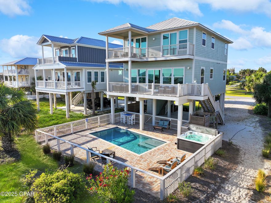 UNDER CONTRACT - ACCEPTING BACKUP OFFERS!  A stunning 4BR/4.5BA Gulf front beach home nestled in the beauty of Indian Pass. This exquisite property offers unparalleled views and a serene lifestyle on the tranquil shores of the Forgotten Coast. Step inside to discover a spacious main living area with an open-concept kitchen featuring granite countertops, modern appliances, a breakfast bar, and a pantry. The dining area seamlessly extends to a large deck, perfect for outdoor dining while soaking in the breathtaking Gulf views. This home boasts three expansive master suites and a charming bunk suite, each with private en-suites and spectacular vistas. Outside, enjoy the luxury of a private pool, an outdoor shower, and a private boardwalk leading directly to the pristine sandy beaches. Immerse yourself in the ''Old-World'' charm of Indian Pass, where adventure awaits just a short drive away. Launch your boat at the nearby Indian Pass boat ramp for a day of fishing in the lagoon, exploring the untouched beauty of St. Vincent Island, or enjoying a family outing on the Gulf. Experience the ultimate coastal lifestyle, where every day feels like a vacation. Don't miss your chance to own a piece of paradise on the Forgotten Coast!