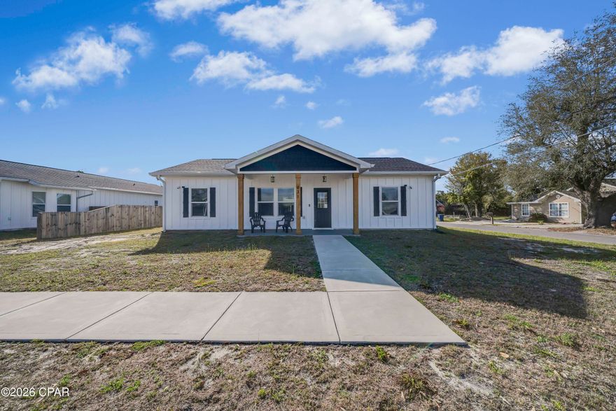 Indroducng 631 Maine Ave, a craftsman style, 3 bedroom, 2 bath home located in the heart of Panama City Florida.  Built in 2023 and finished in 2024, this home looks and feels just like a brand new home.  The interior is an open concept with a great room/eat in kitchen with a massive island, breakfast bar, stainless oven hood, shaker style cabinets, quartz countertops and stylish backplash.   Luxury vinyl plank floors run throughout the home for easy maintenance and durability.  The master suite is spacious and features a walk in closet, big shower and a quartz double vanity.   Bedrooms 2 and 3 are both large and share a full bath.  The laundry room has a side door, room for storage and has an efficient electric tankless water heater.   Craftsman style doors and trim are throughout and the home comes with a generous appliance package.   The exterior of the home is constructed with Hardi Board and Batton siding and has a covered front porch and open patio. As an added bonus the double lot provides room for a pool and or a garage easily.   Come see what this modern, efficient home, conveniently located to EVERYTHING has to offer.   Call Your Realtor today